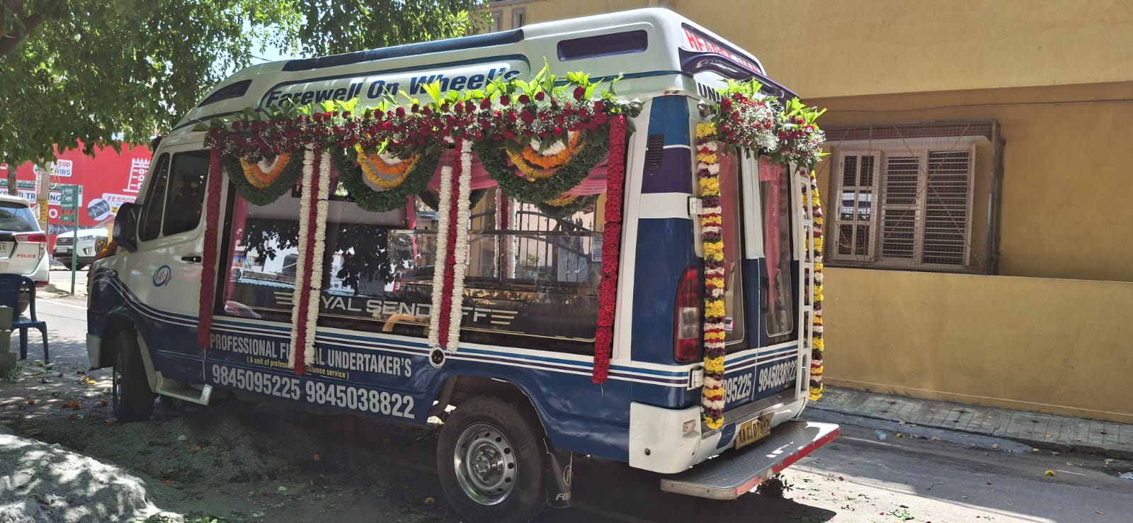 Funeral vehicle decorated with flowers